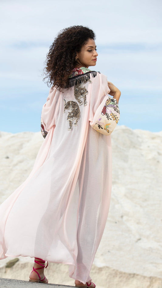 women wearing a modern designer abaya kimono with luxury elements from #Mary and Mary#