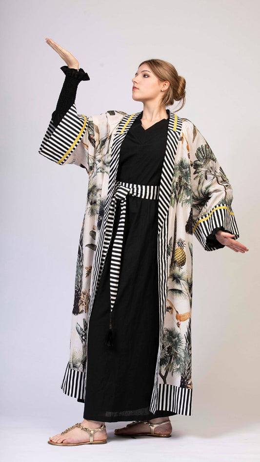 women wearing a modern designer abaya kimono with luxury elements from #Mary and Mary#