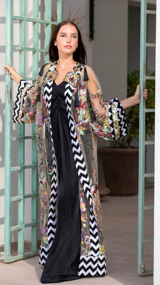 women wearing a modern designer abaya kimono with luxury elements from #Mary and Mary#