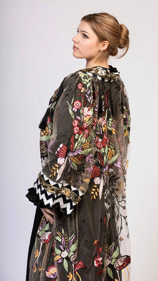 women wearing a modern designer abaya kimono with luxury elements from #Mary and Mary#