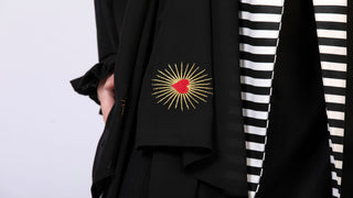women wearing a modern designer abaya kimono with luxury elements from #Mary and Mary#