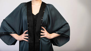 women wearing a modern designer abaya kimono with luxury elements from #Mary and Mary#